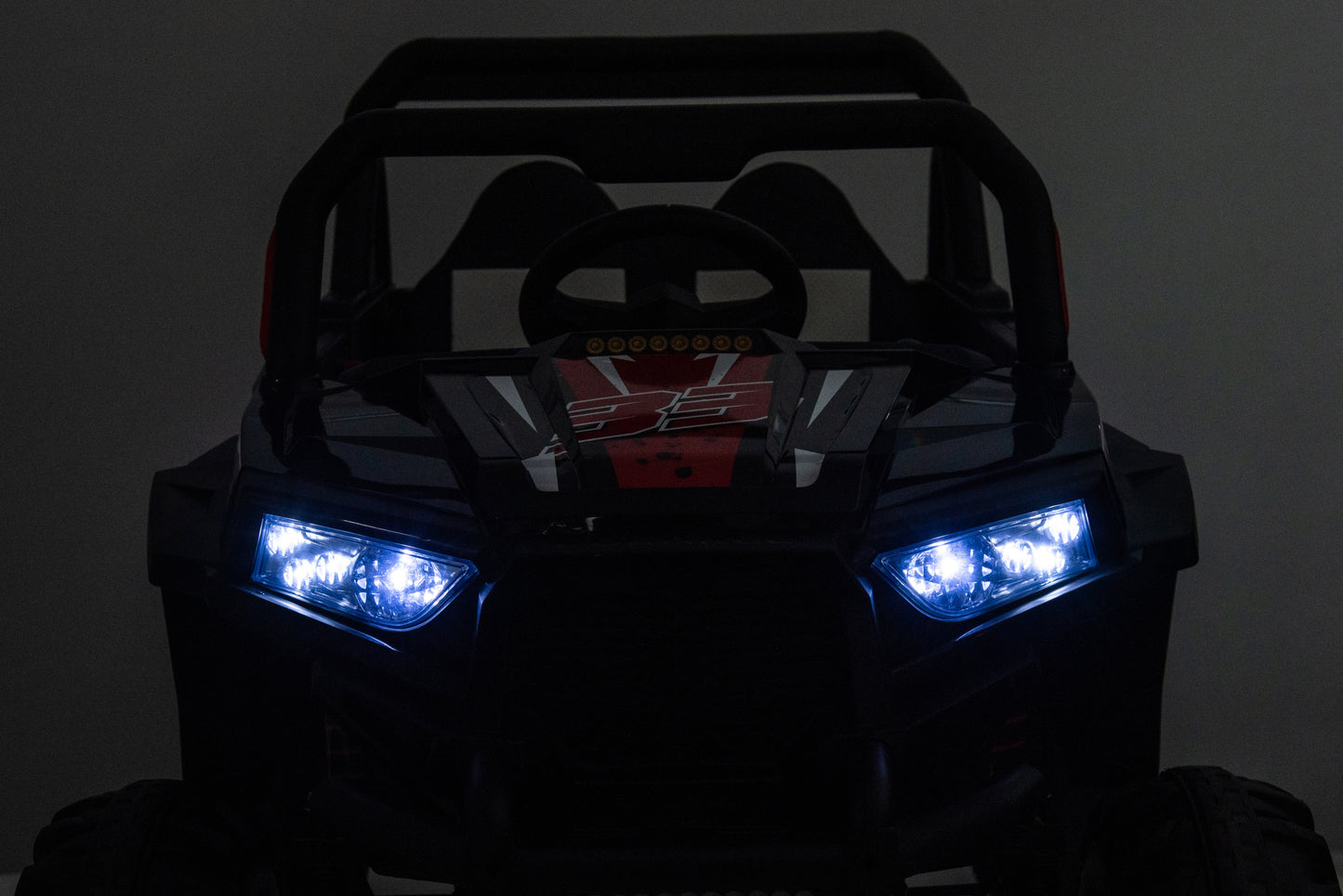 12v7a*1 30w*4 Four-wheel drive leather seat one button start,forward and backward, high and low speed, music, front light, power display, two doors can open, 2.4G R/C, seat belt four wheel absorber